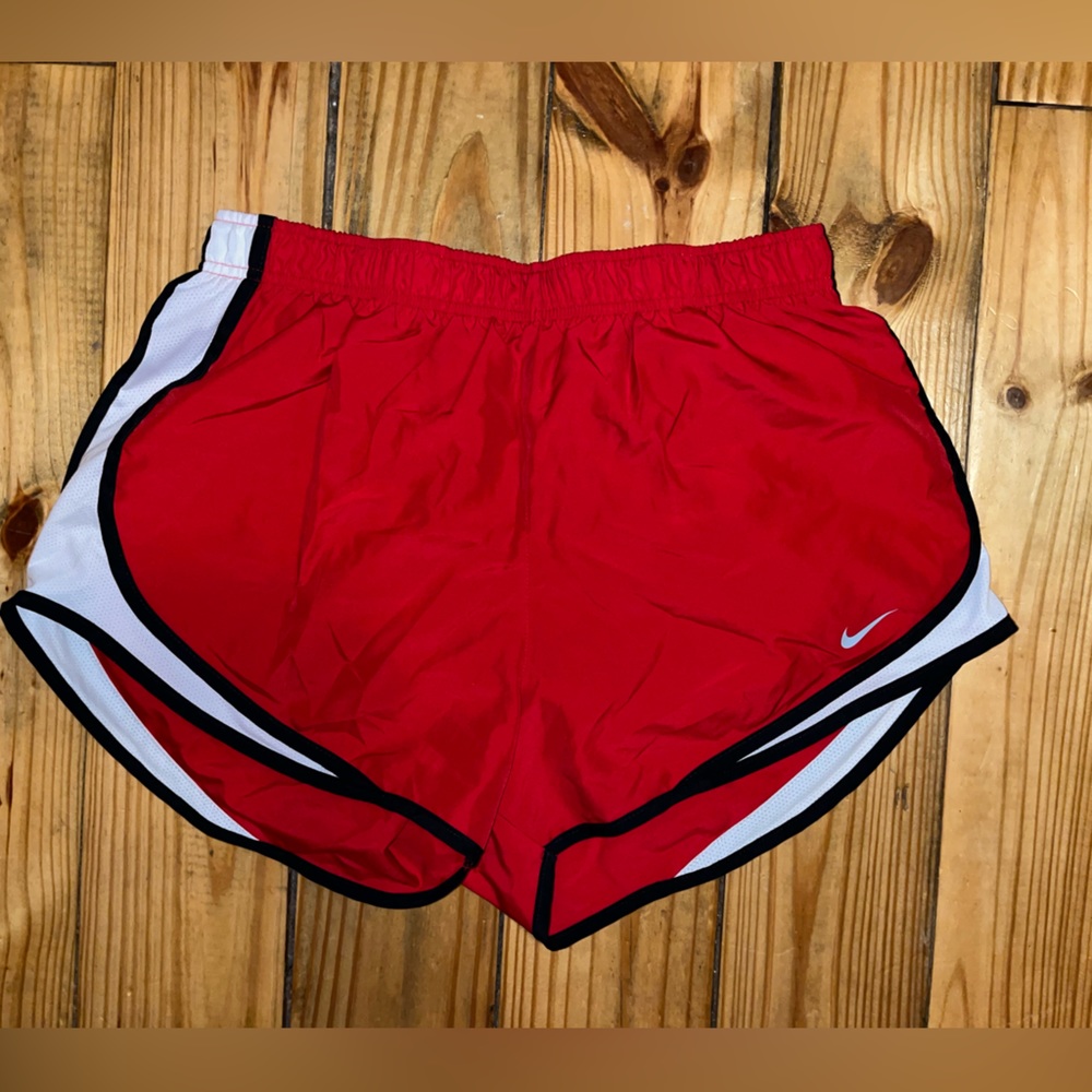 Red Nike athletic shorts